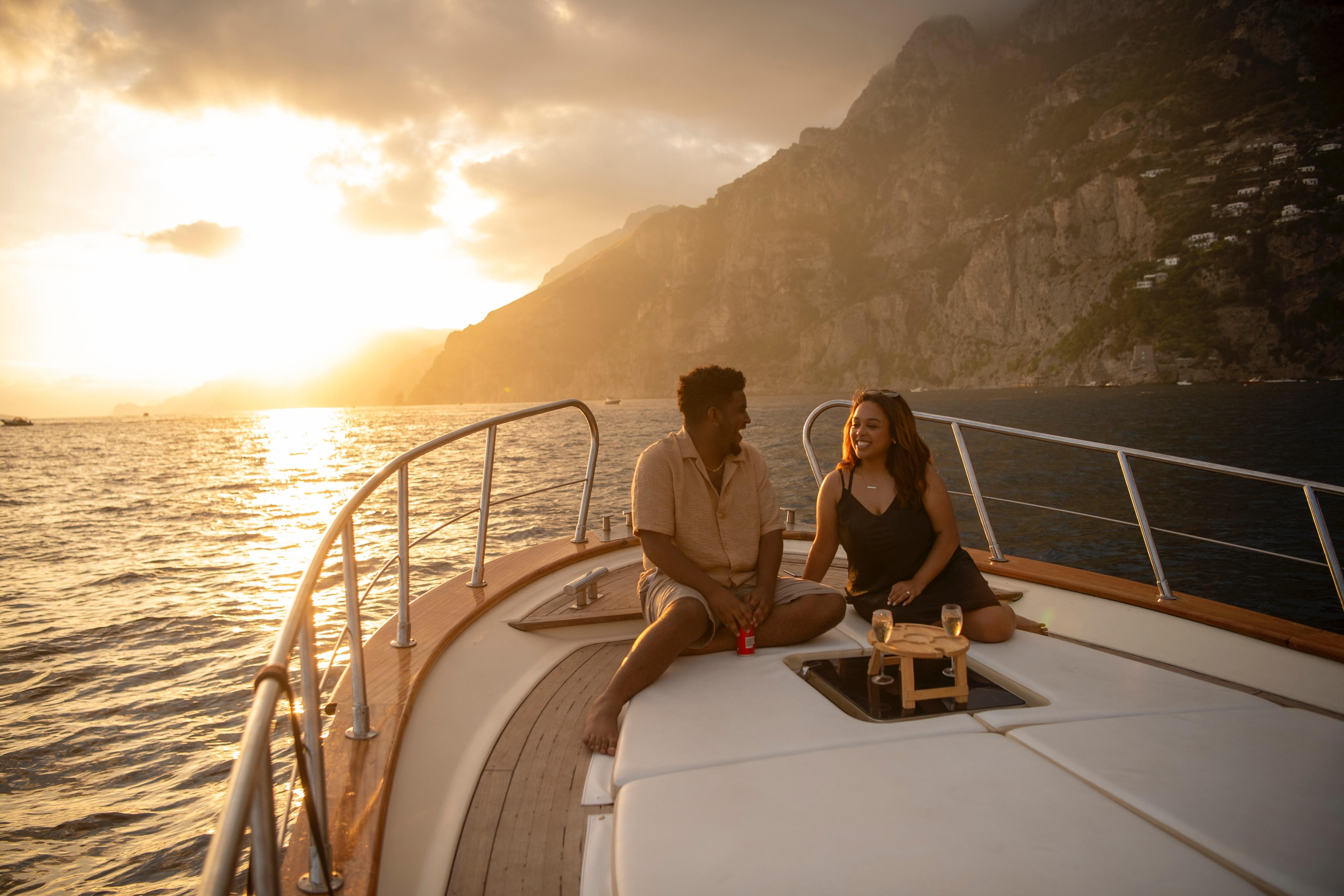 Mahlet and Michael relaxing together during golden hour on the yacht